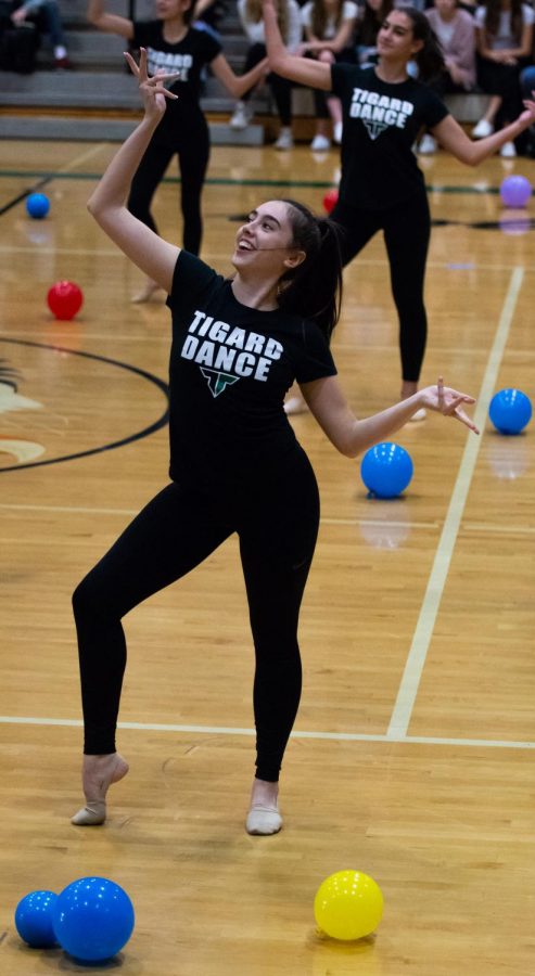 Senior, captain Abby Mullins performs with Tigerettes during the homecoming assembly. The assembly included some games, the Tigerettes performance and introduced the homecoming court to the student body.