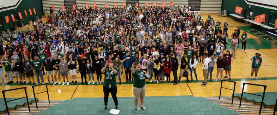 Counselor Emily Cabrera and On Track Coordinator Cindy Pellicci take selfies with the freshman class during Link Day. Pellicci and Keri Butler (not pictured) were hired to help make the transition to high school smooth for freshmen.