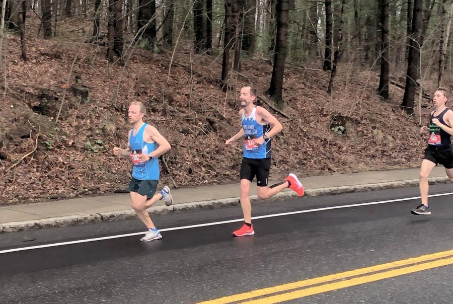 Chris McIsaac jogs down the Boston roads on April 15. McIsaac finished with a final time of 3:54:32.