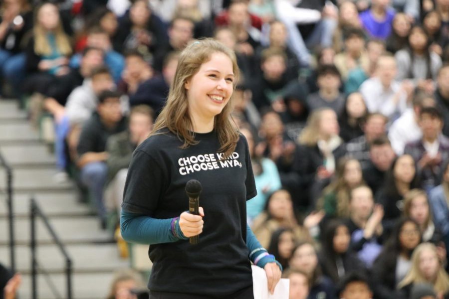 At+the+Sparrow+Assembly%2C+Chloe+Skinner+tells+students+what+Sparrow+Club+is+about.+She+was+excited+to+see+the+students+rally+behind+Sparrow+Mya+Muckey.