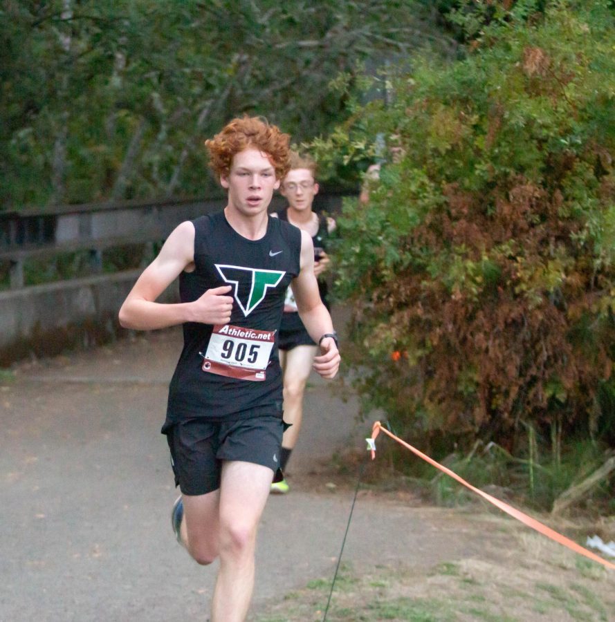 Matthew Moller competes in the dual meet against Tualatin during the 2018 season. Moller placed second at the Rust Buster 4K in 13:33.73 at Blue Lake Park on Sept. 7.