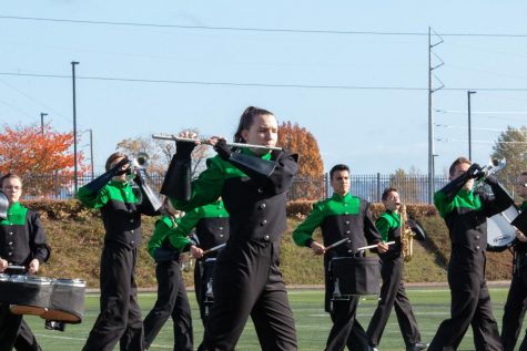 Madison Hotchkiss (front) and the rest of the band participate in the NWAPA Championship on Nov. 2. The team brought home the title for the 12th time.