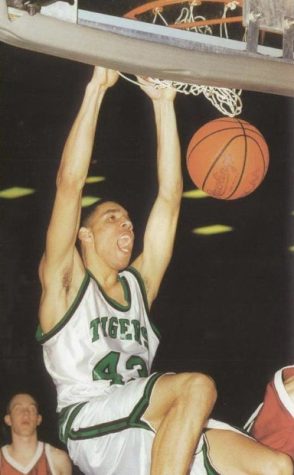 Slider dunking a basketball during his time at Tigard. He graduated in 1997, and continued to play basketball around the world for years to come.