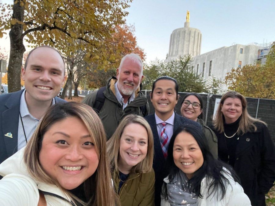 Recently elected freshmen legislators pause for a selfie before orientation. From left to right (in front): Hua Nguyen, Emerson Levy, Thuy Tran.